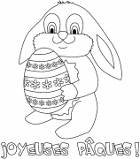 Lapin tenant un oeuf de Pâques multicolore - coloriage n° 122